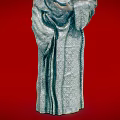 Mysterious Game Movie Character With White Mask Gold Spiral Eyes And Mesh Clothing On Red Background
