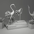 Gold And Silver Crane Decorative Ornament Set On White Bases And Orange Display Stands