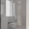 Modern Bathroom Interior Design With White Blinds Glass Shower Sink And Toilet