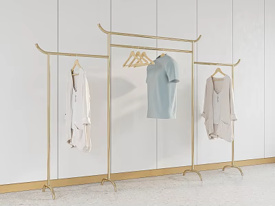 Golden Metal Clothes Rack With White Shirt Light Blue T shirt And Light Coat Hanging 3d model