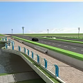 Modern Road Bridge with Cars Street Lamps Over Water and Green Surroundings