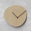 Minimalist Round Wooden Clock With Black Hands And Light Wood Dial On Gray Background