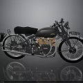 Vintage Black Motorcycle With Black Leather Seat Shiny Metallic Engine And White Wall Tires