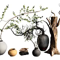 Various Shaped Vases With Green Plant Branches And Wooden Decor Accents