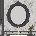 Round Black Carved Frame Mirror On Floral Wallpaper With Flower Bouquet And Towel Rack