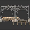 Industrial Metal Frame Structure with Sandbags and Concrete Base Supports