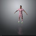 Football Player In Pink Jersey With XETO Logo Number 10 Captain Armband