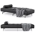 Modern Black Leather Chaise Lounge With Metal Legs Rolled Cushion And Gray Throw Blanket