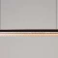 Modern Linear Chandeliers With Circular Shades And Warm Lighting For Dining Space