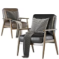 Modern Accent Chairs With Brown Black Leather Upholstery Patterned Pillows And Gray Throw Blankets