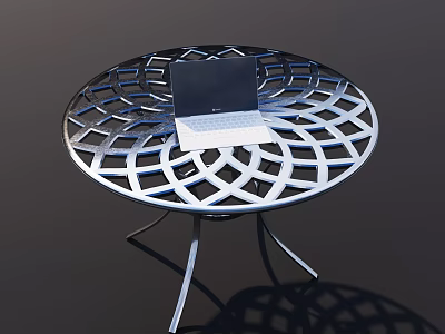 Round Metal Outdoor Table With Intricate Cutout Design And Laptop On Top 3d model