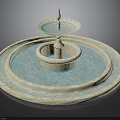Multi Tiered Circular Fountain Design With Blue Water And Light Colored Edges