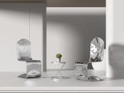 Modern Metallic Table And Chair Set With Sleek Lines And Small Potted Plant 3d model