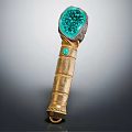 Ornate Golden Decorative Scepter With Green Gemstone Top And Textured Surface