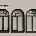 Black Arched Top Casement Windows Display Three Double Panel Units Mounted On Beige Wall 3d model