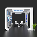 Modern Event Exhibition Wall with Cultural Display Screens Tables Chairs and Green Plant