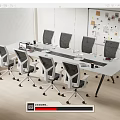 White Conference Table With Modern Office Chairs And Whiteboard In Modern Office Space