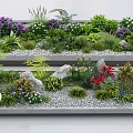 Colorful Flowers and Plants in Rectangular Planter Boxes With Stones and Pebbles
