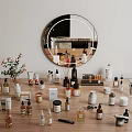 Modern Vanity Table Display With Perfume And Cosmetic Collection Various Bottles Plants And Mirror