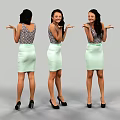 Woman In Patterned Sleeveless Top And Light Green Skirt Posing With Open Hands
