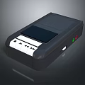 Portable Black Computer Peripheral With Display Screen Control Buttons And Indicator Lights