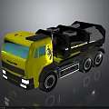 Toy Yellow Volvo Tanker Truck with Black Parts and Large Wheels on Reflective Surface