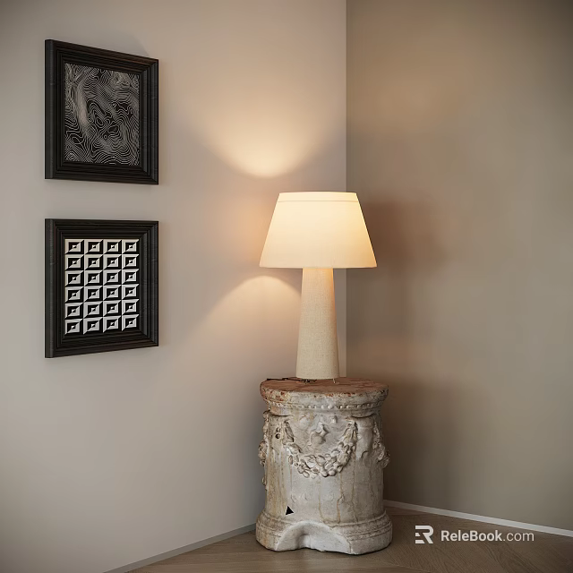 Lighted Table Lamp with Beige Shade on Carved Base Against Wall with Framed Art 3d model 