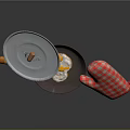 Kitchen Cooking Tools Setup With Frying Pan Fried Egg Lid And Checkered Oven Mitt