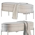 Beige Fabric Sofa Bench With Black Metal Legs And Striped Throw Blanket