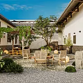 Traditional Chinese Courtyard Garden With Trees Vines Wooden Chairs Table And Pebble Stone Floor