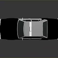 Vintage Black and White Police Sedan With Emergency Lights and Side Markings