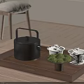 Minimalist Modern Tea Set with Black Container Patterned Cups and Moss Decoration on Wooden Tray
