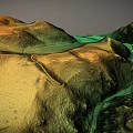 Colorful Topographic Landscape With Rolling Hills Green Valleys And Orange Yellow Ridges