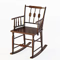 Traditional Wooden Rocking Chair With Armrests And Decorative Circular Backrest Design