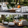 Modern Outdoor Sofa Set With Comfortable Cushions And Wooden Coffee Table In Garden
