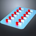 Medical Device Blister Pack With Red And White Capsules In Blue Packaging Arranged Neatly
