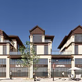 Modern Commercial Street With Luxury Retail Shops Outdoor Seating Areas And Pedestrian Activity