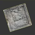 Damaged Square Concrete Structure With Scattered Debris And Broken Edges