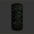 Off-Road Tire With Deep Tread Pattern And Black Metal Rim Design For Durable Use