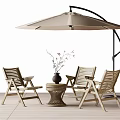 Three Wooden Outdoor Chairs With Small Table Vase And Beige Umbrella On Patio