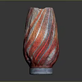Colorful Glass Vase With Red Orange Blue Stripes And Glossy Surface On Dark Background