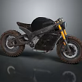 Sleek Black Off Road Motorcycle With Yellow Handlebars And Large Treaded Tires