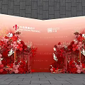 Elegant Floral Installation For Grand Opening Ceremony With Red Pink Flowers And Decorative Backdrop