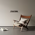 Poliform Leisure Chair with Wooden Frame Woven Backrest and Magazine in Minimalist Interior