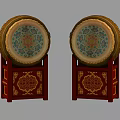 Traditional Musical Instruments Drums Featuring Golden Rims And Painted Patterns On Red Wooden Stands