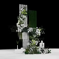 Elegant Floral Installation with White Flowers Green Foliage and Decorative Columns
