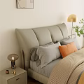 Modern Double Bed with Gray Upholstered Headboard Gray Orange Pillows Yellow Blanket and Floor Lamp