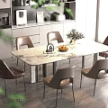 Modern Dining Area With Marble Top Table Six Brown Chairs Fruits Flower Vase And Cabinets