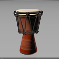 Red Djembe Drum With Black Ropes White Drumhead And Conical Striped Base Musical Instrument
