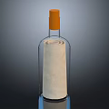 Standing Transparent Glass Bottle With Orange Cap And Rolled Paper Inside